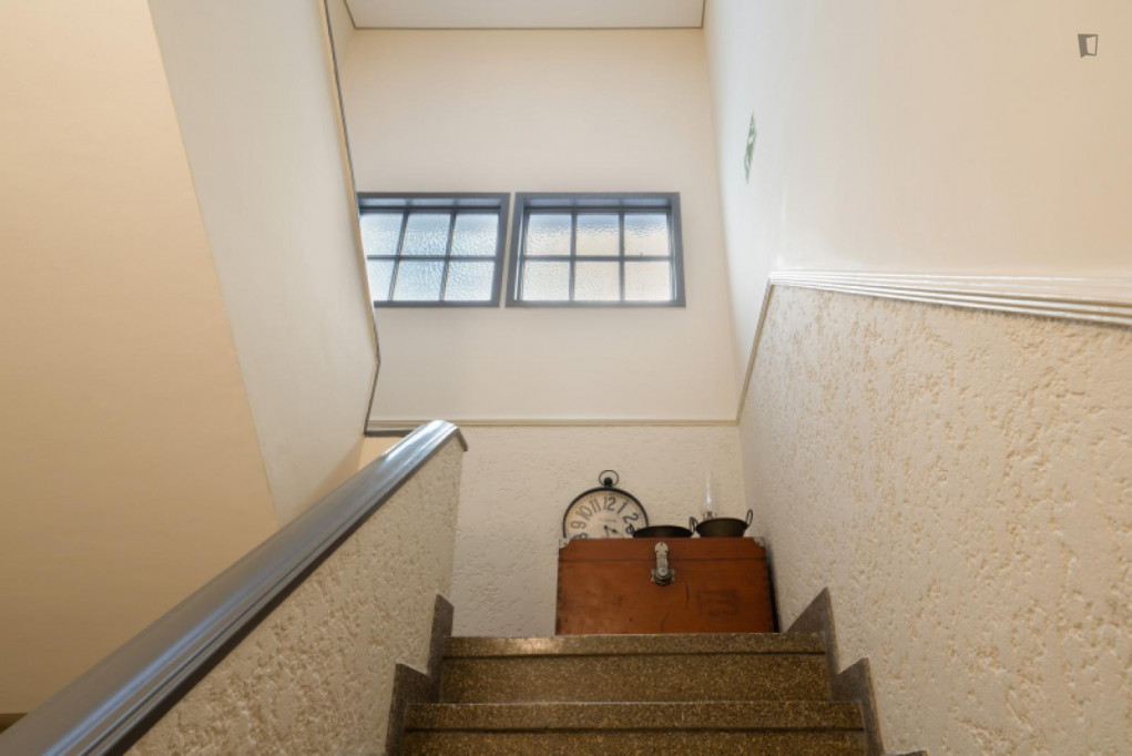 Sophisticated 2-bedroom apartment with balcony steps from Jardim do Morro