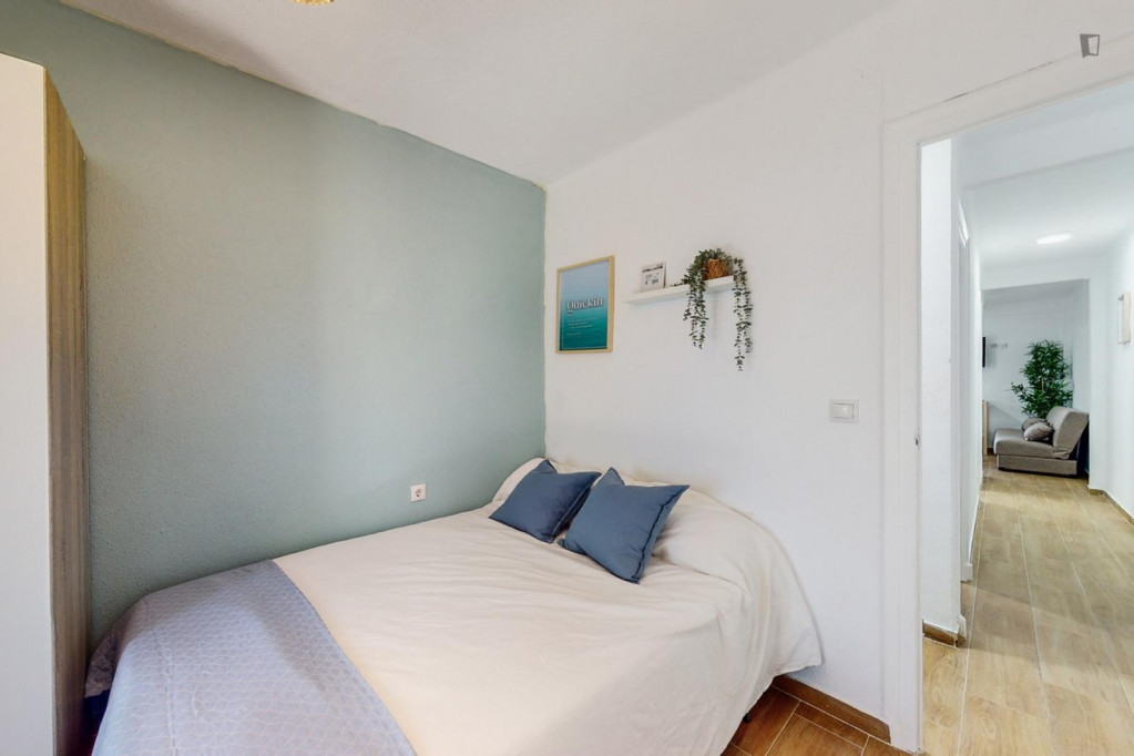 Cozy single bedroom with balcony
