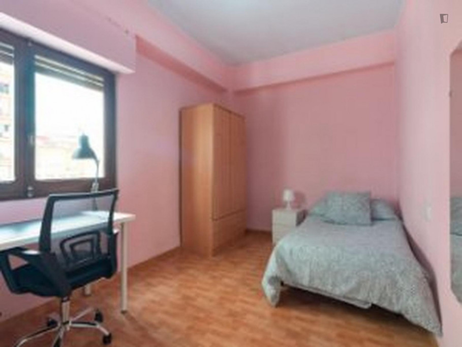 Cozy single bedroom in a property with balcony