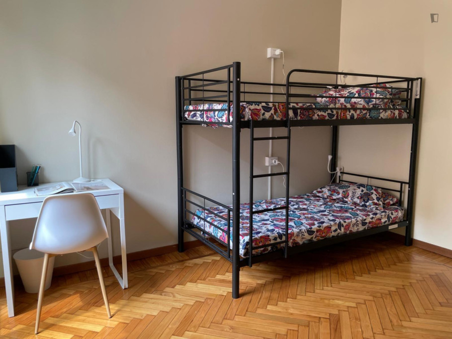 Bed in a twin bedroom in Crescenzago - Milan - chambre - ImmoJeune