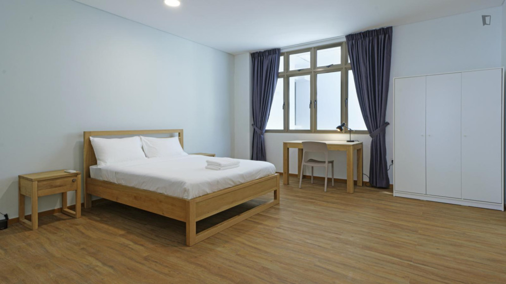 Inviting double bedroom within the Jalan Besar conservation area - Singapore - chambre - ImmoJeune