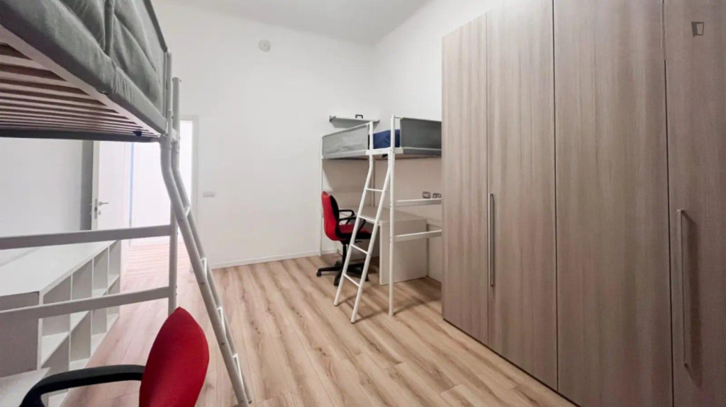 Bed in a comfy twin bedroom, in Portello - Milan - chambre - ImmoJeune