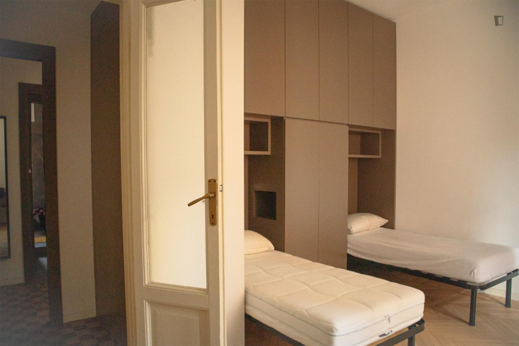 Multiple beds bedroom in 3-bedroom apartment