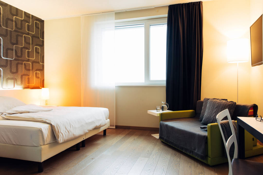 Wonderful and cozy studio at the Moosacher Bahnhof with the comfort of a hotel