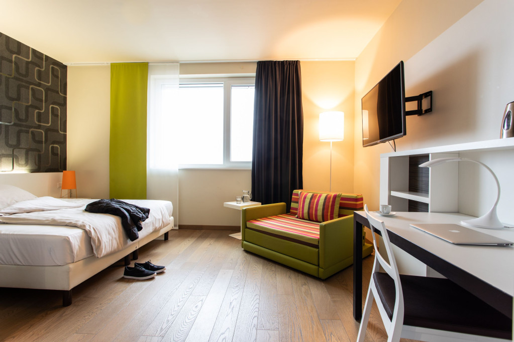 Wonderful and cozy studio at the Moosacher Bahnhof with the comfort of a hotel