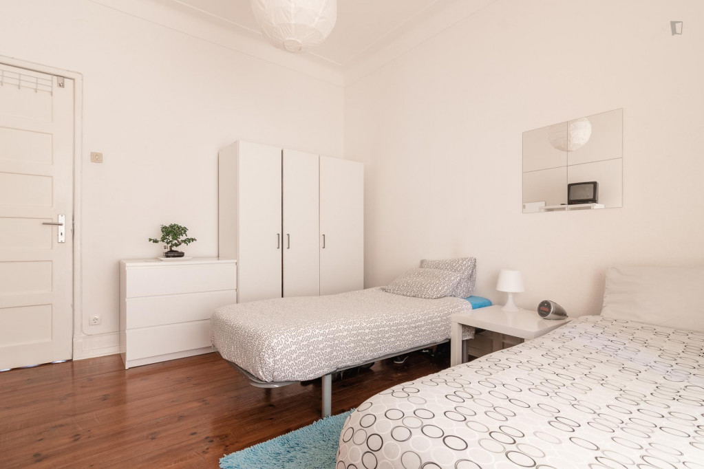 Twin bedroom with balcony in student apartment near Areeiro metro station