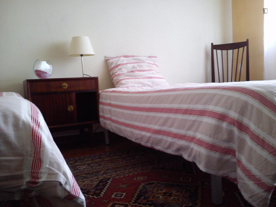 Comfy twin bedroom with a balcony in Paranhos