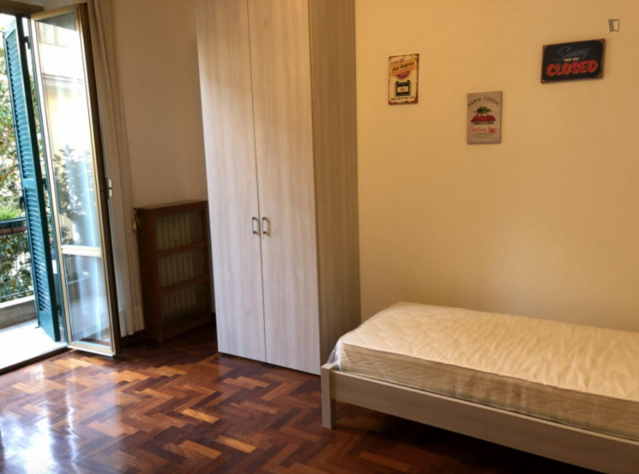 Inviting single bedroom with a balcony, near the green Villa Doria Pamphili