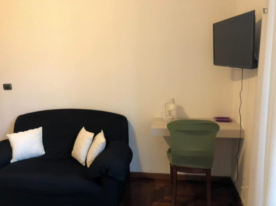 Inviting single bedroom with a balcony, near the green Villa Doria Pamphili